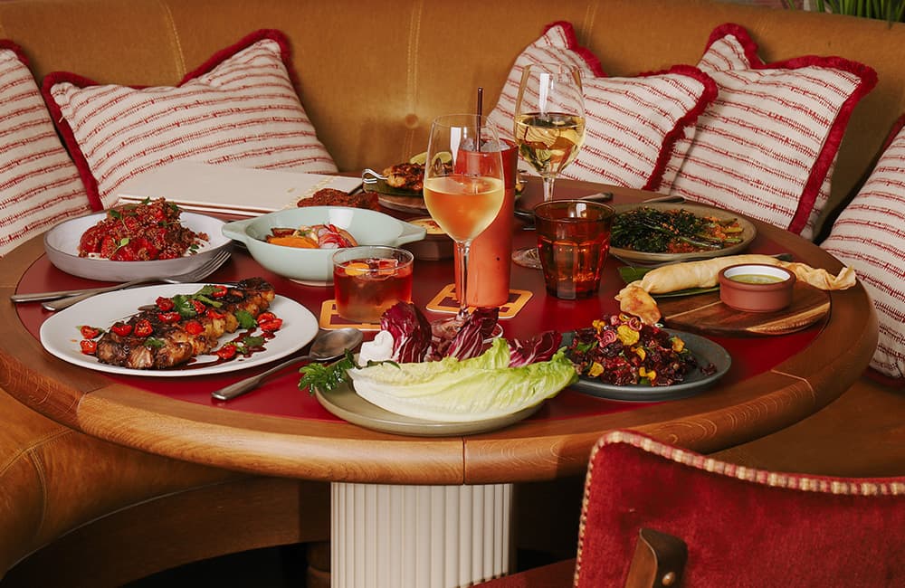 A full-table spread of healthy and delicious Cantina Valentina wine and grub.